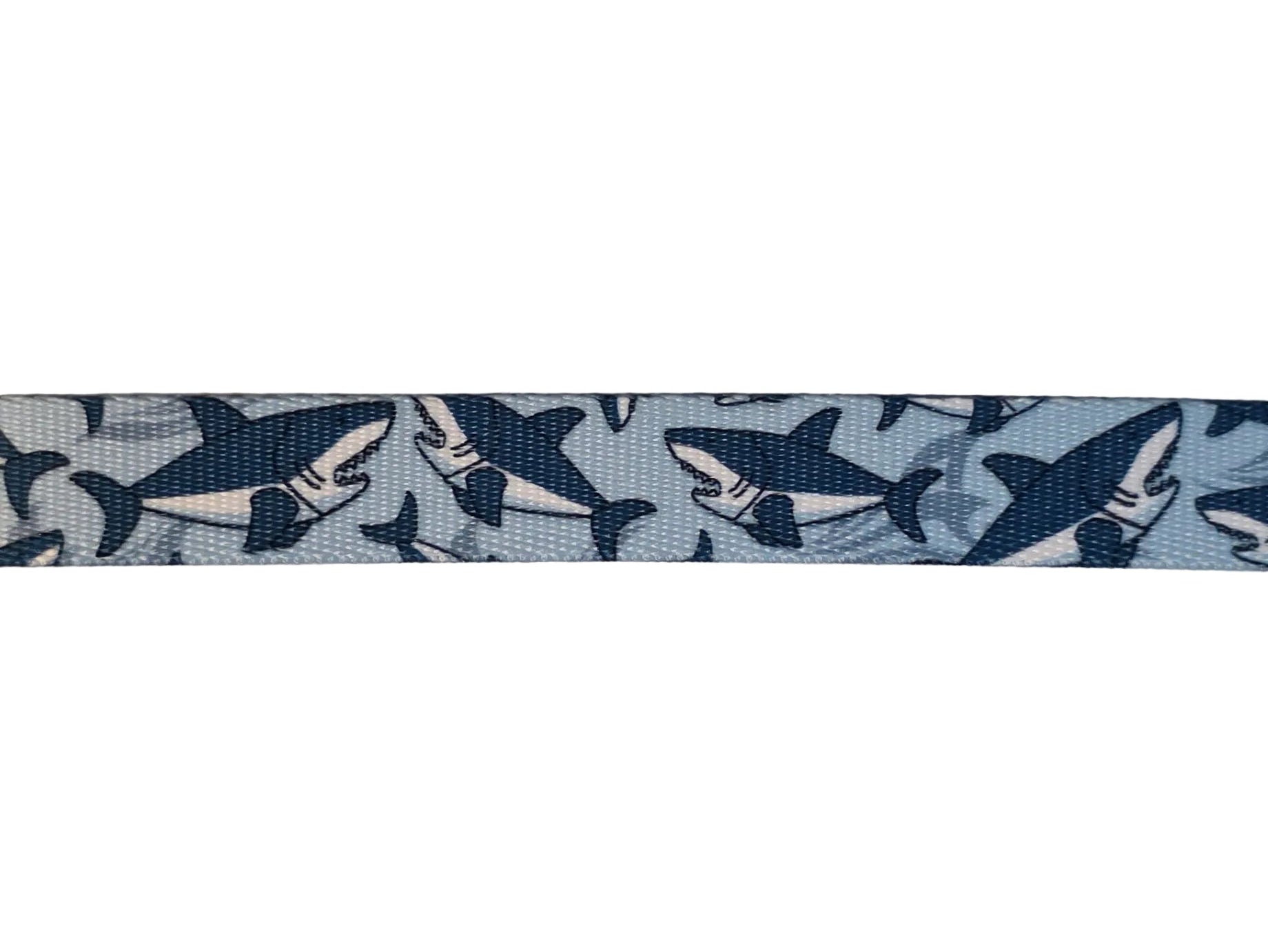 Polyester webbing with shark pattern on a light blue background
