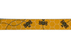 Polyester webbing with black honey bee pattern on a yellow with white honeycomb background
