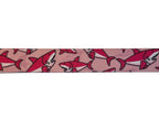 Polyester webbing with shark pattern on a light pink background